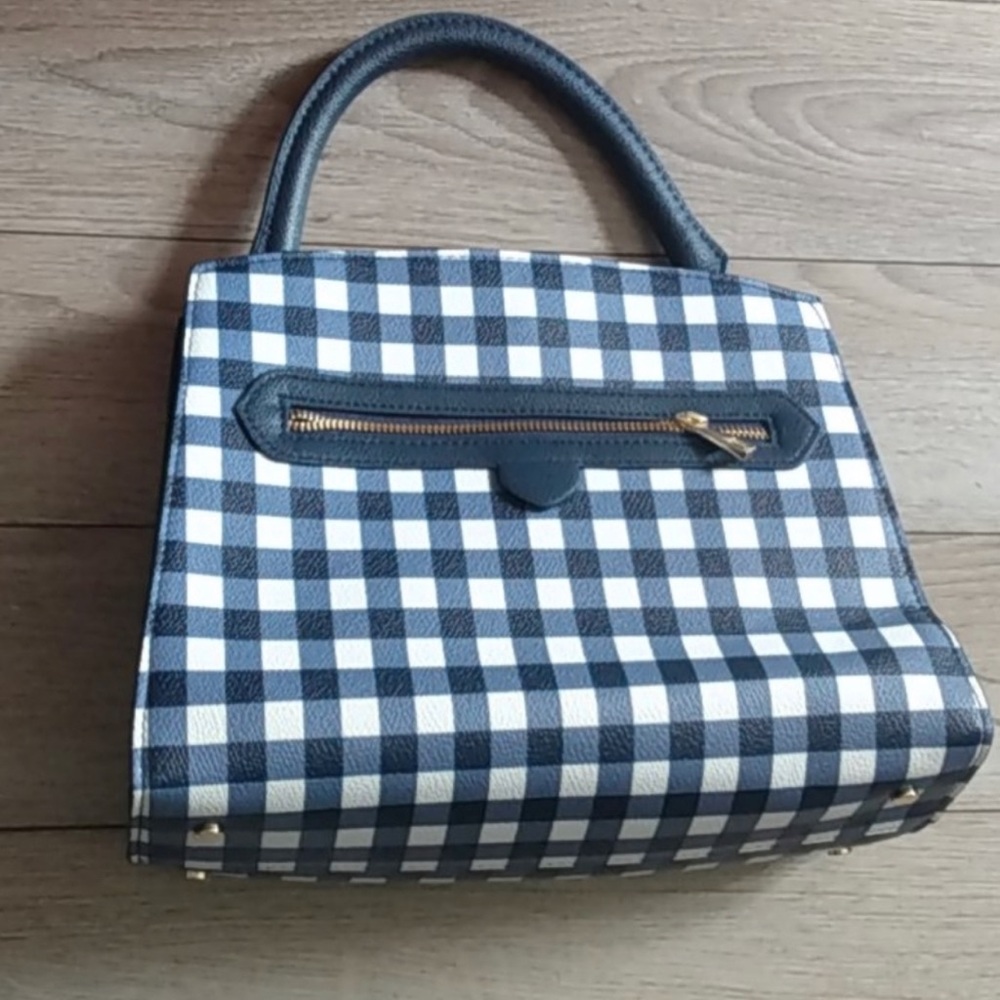 A new day purse never use.